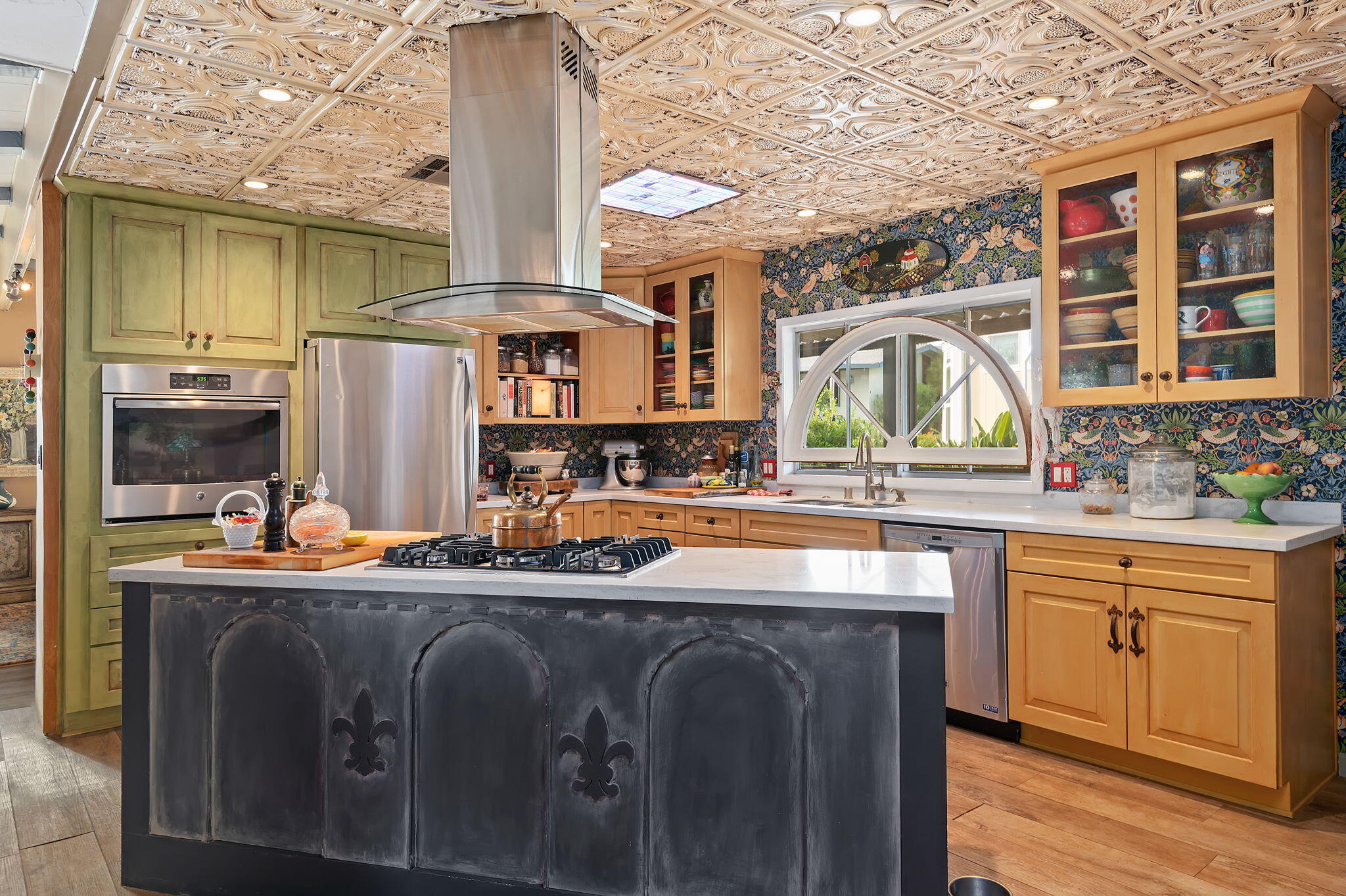 340 Old Mill Road, Unit 26 Santa Barbara, CA 93110 - Photo 10 of 31 a kitchen with stainless steel appliances a sink stove and cabinets
