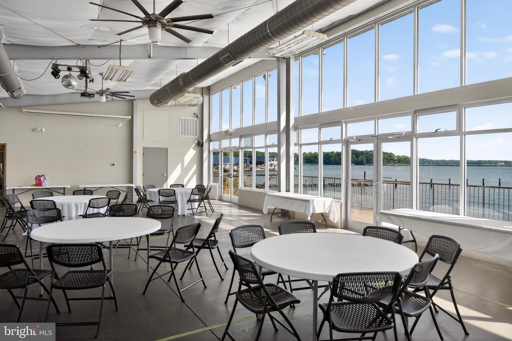 3670 5th Avenue Edgewater, MD 21037 - Photo 45 of 60 a view of a dining room with furniture window and outside view