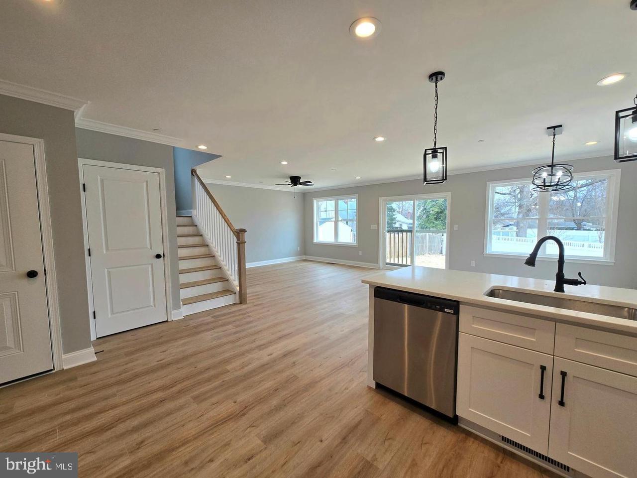 8478 Garden Road Pasadena, MD 21122 - Photo 1 of 14 a kitchen with sink and window