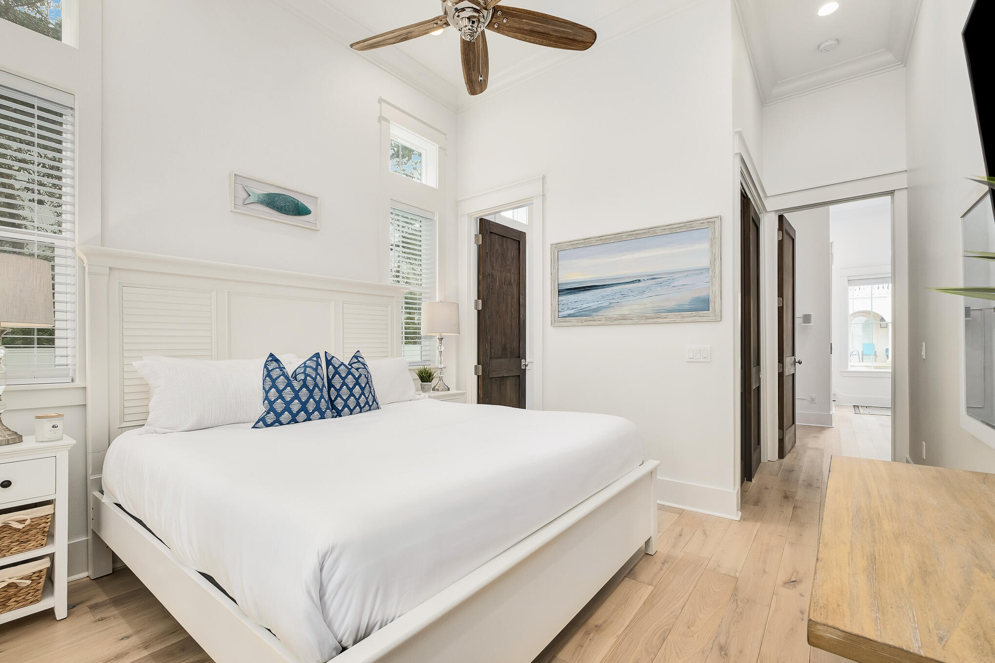 81 Palmeira Way Santa Rosa Beach, FL 32459 - Photo 11 of 74 a bedroom with a bed and a chandelier