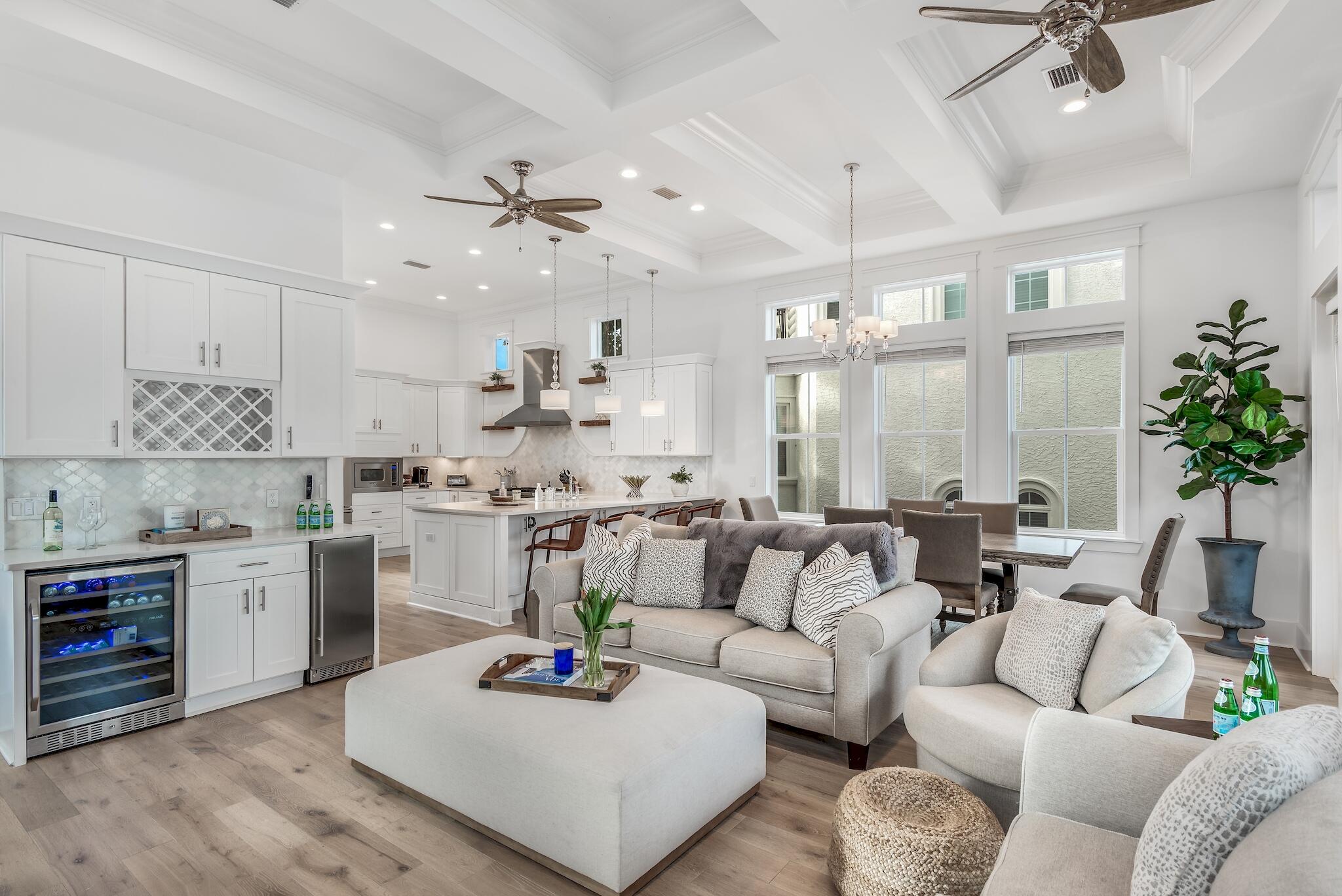 81 Palmeira Way Santa Rosa Beach, FL 32459 - Photo 21 of 74 a living room with furniture kitchen view and a chandelier