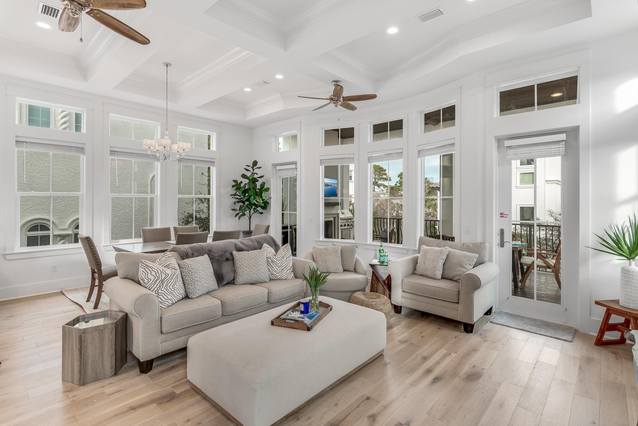 81 Palmeira Way Santa Rosa Beach, FL 32459 - Photo 22 of 74 a living room with furniture and a large window