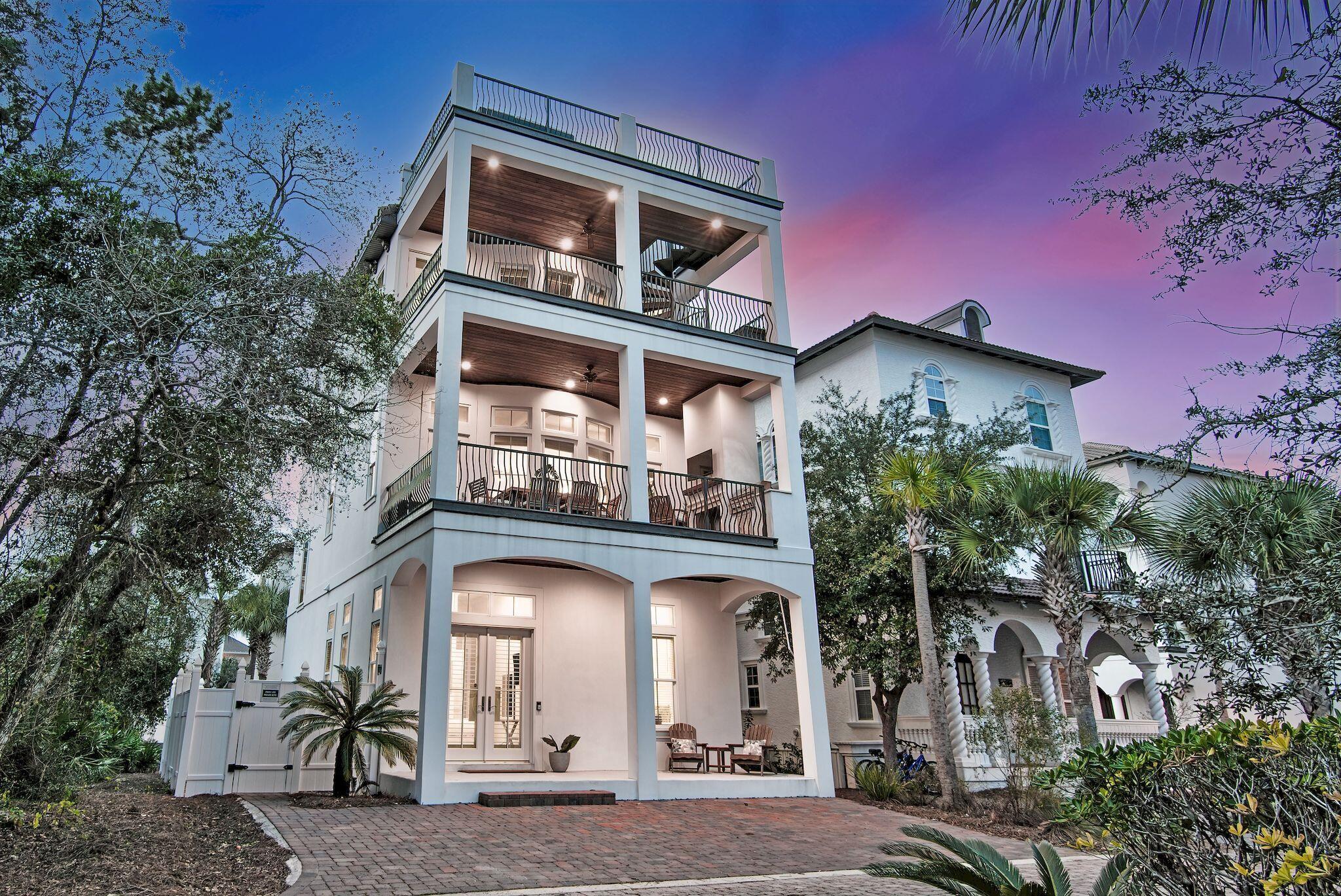 81 Palmeira Way Santa Rosa Beach, FL 32459 - Photo 4 of 74 a front view of a house with a tree