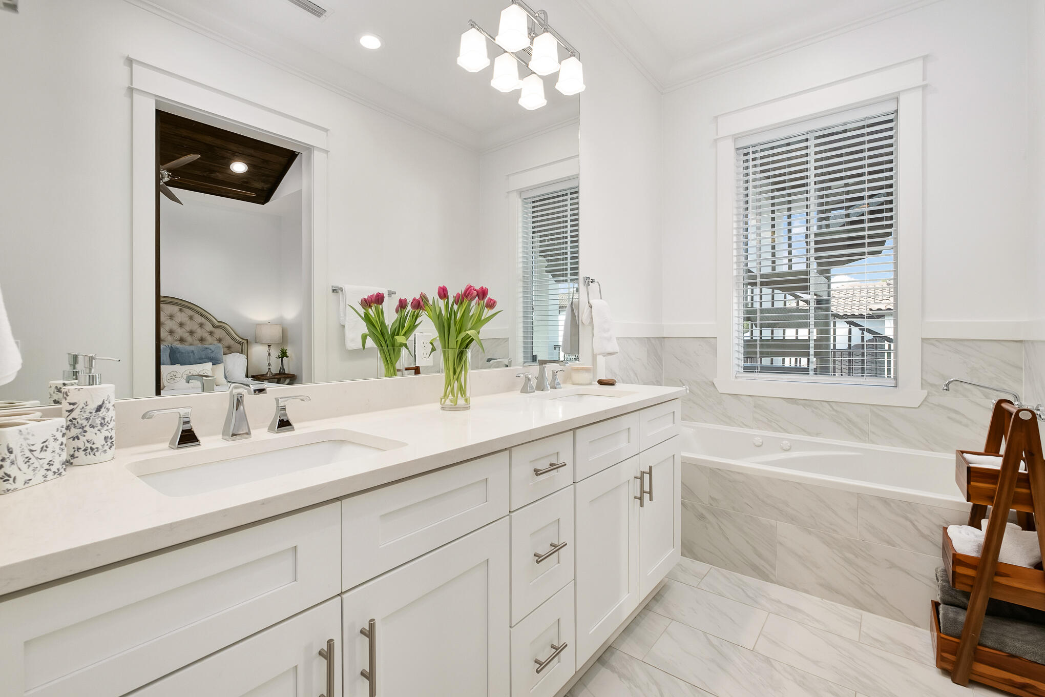 81 Palmeira Way Santa Rosa Beach, FL 32459 - Photo 43 of 74 a bathroom with a tub a sink and a large mirror