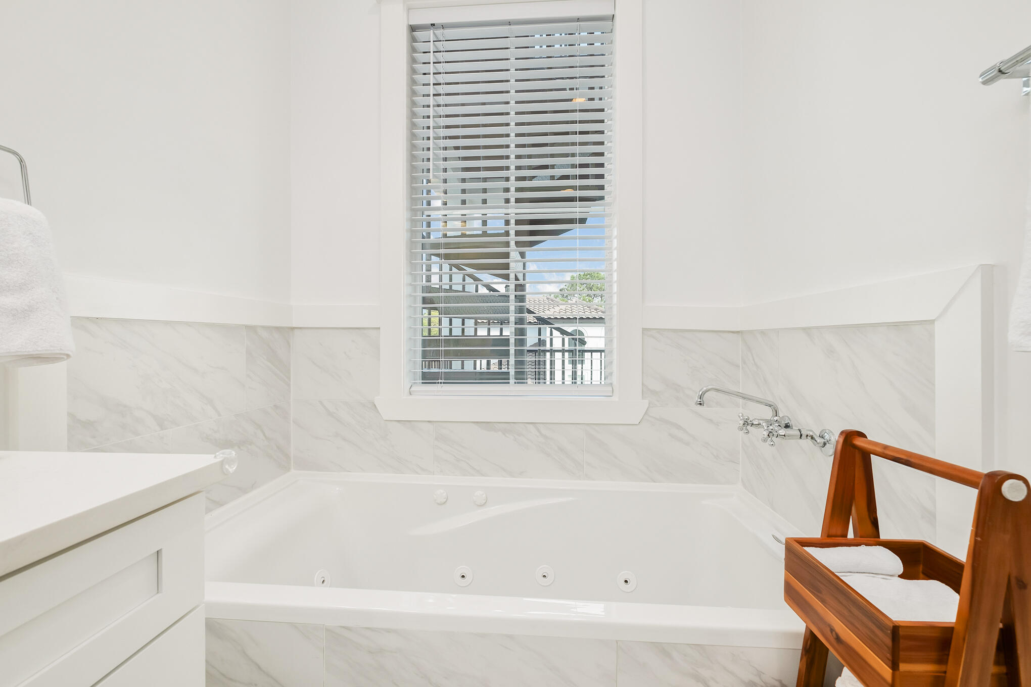 81 Palmeira Way Santa Rosa Beach, FL 32459 - Photo 44 of 74 a bathroom with a bathtub and a window