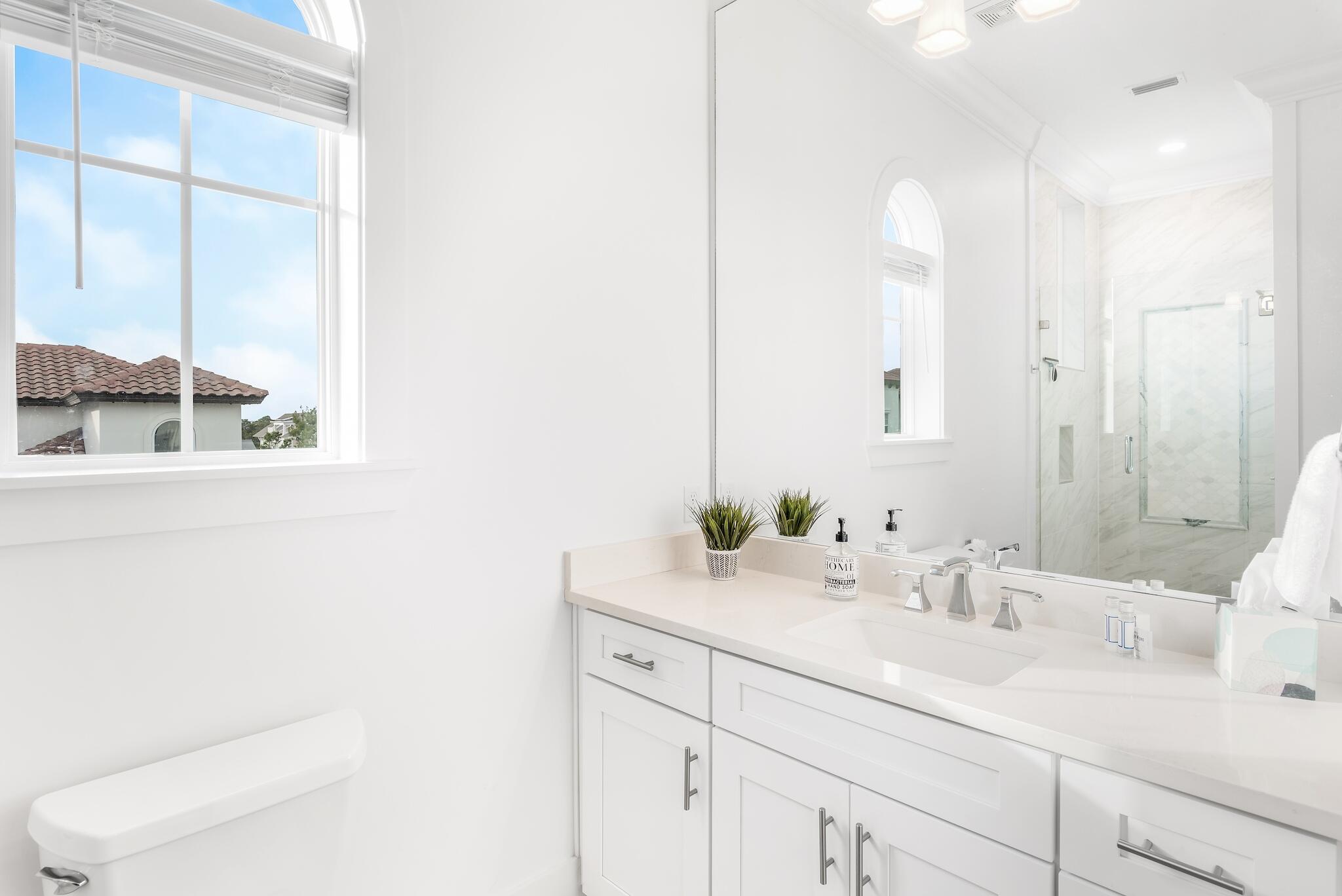 81 Palmeira Way Santa Rosa Beach, FL 32459 - Photo 53 of 74 a bathroom with a sink and a mirror