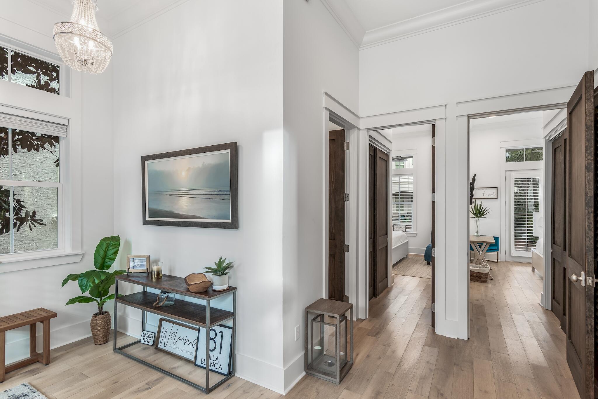 81 Palmeira Way Santa Rosa Beach, FL 32459 - Photo 7 of 74 a living room with furniture a flat screen tv and a table