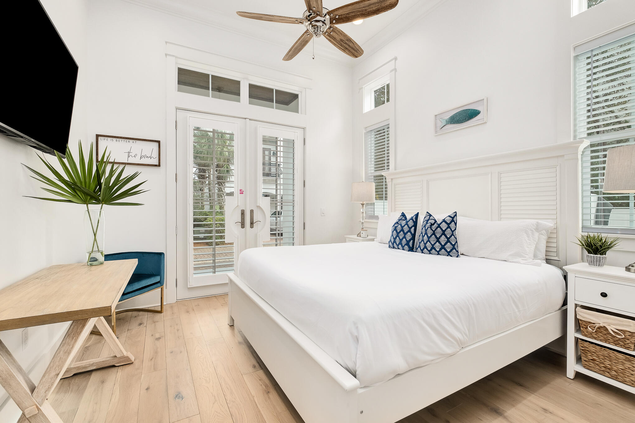 81 Palmeira Way Santa Rosa Beach, FL 32459 - Photo 9 of 74 a bedroom with a bed and a table with potted plants