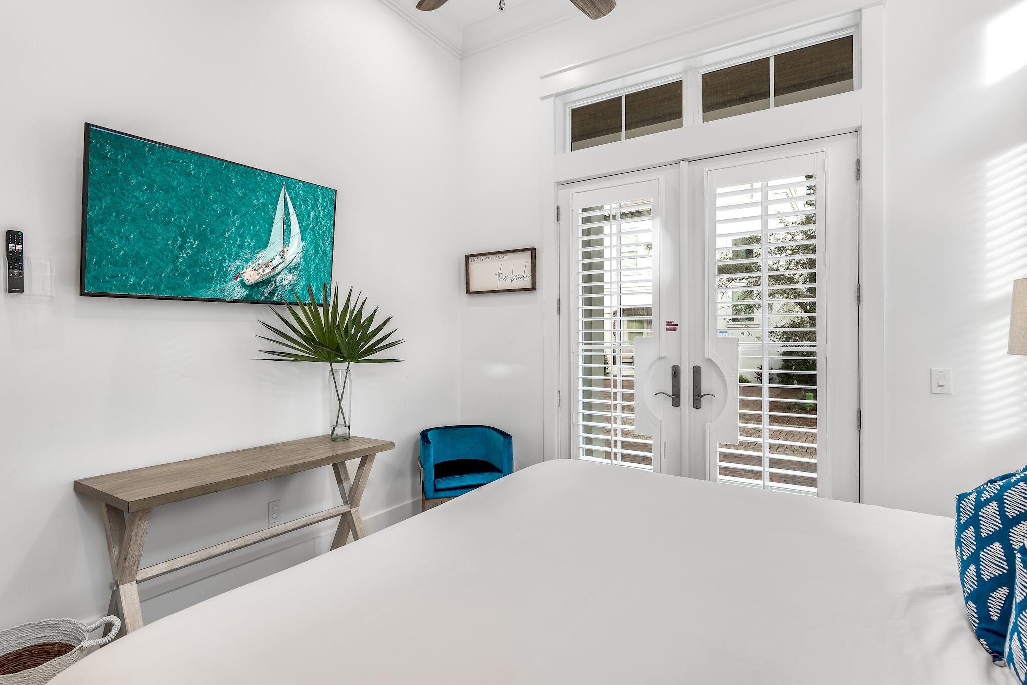 81 Palmeira Way Santa Rosa Beach, FL 32459 - Photo 10 of 74 a bedroom with a bed and a large window