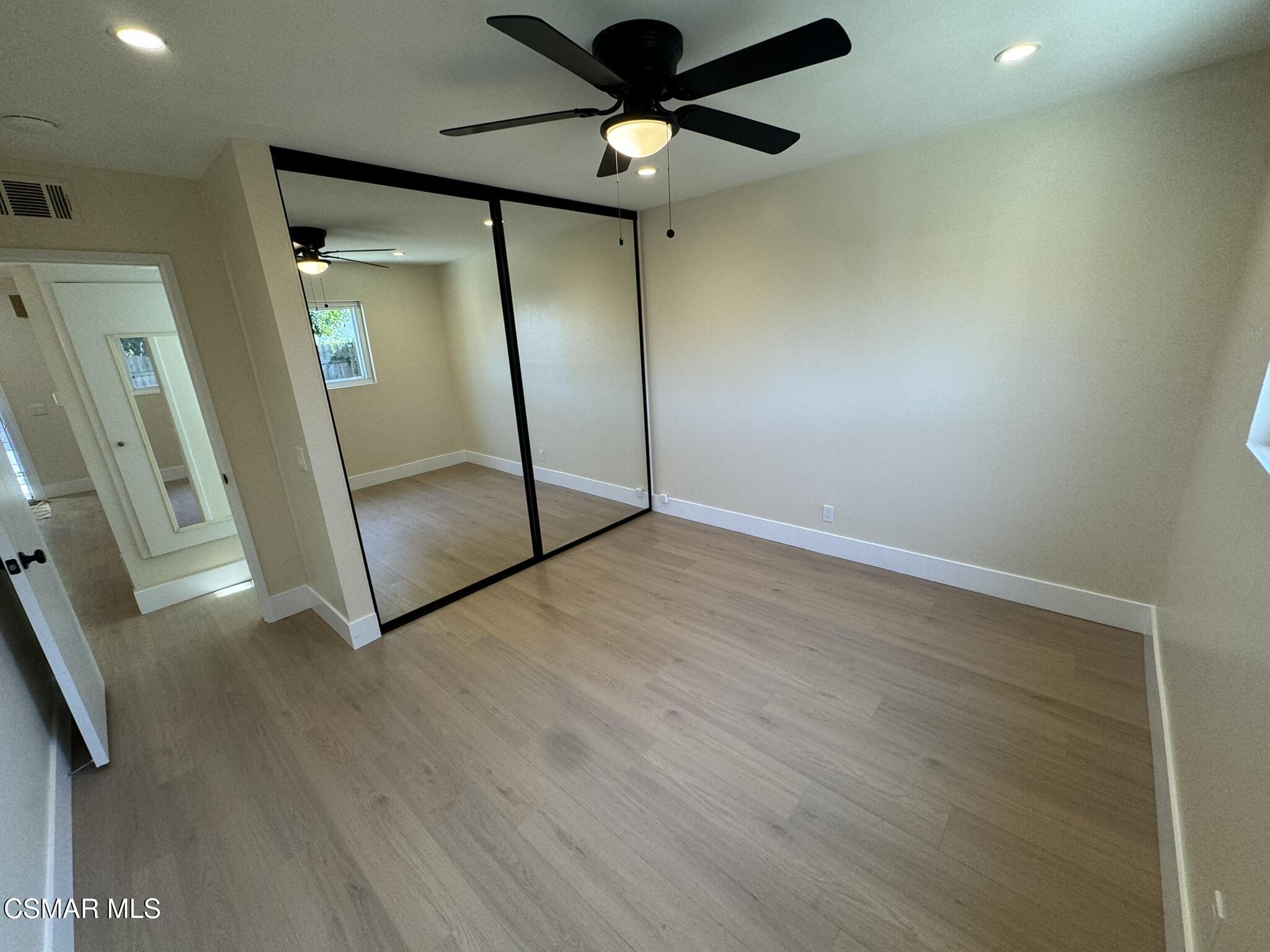 1567 Sequoia Avenue Simi Valley, CA 93063 - Photo 5 of 18 a view of an empty room with a mirror