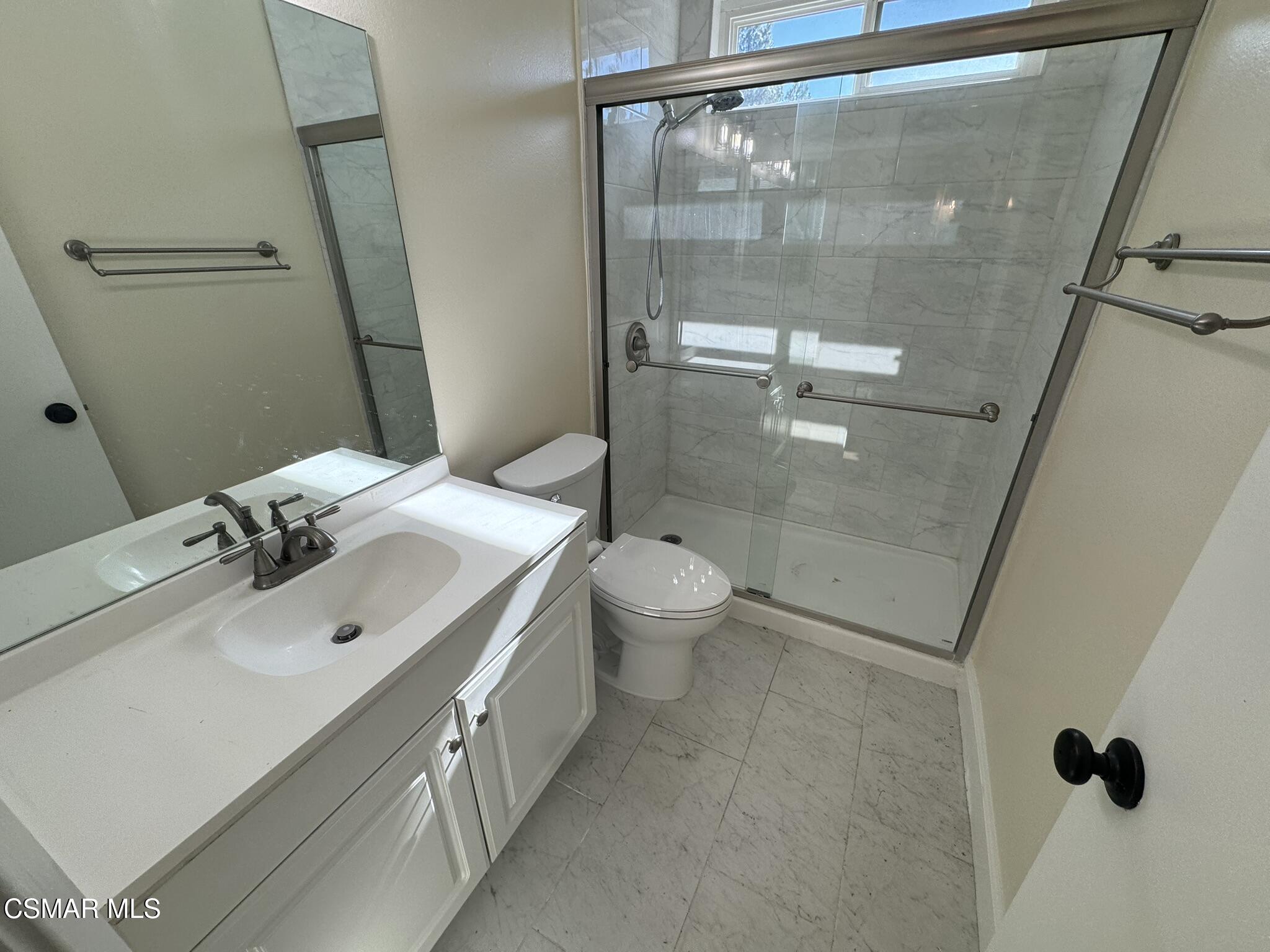 1567 Sequoia Avenue Simi Valley, CA 93063 - Photo 6 of 18 a bathroom with a sink toilet and shower