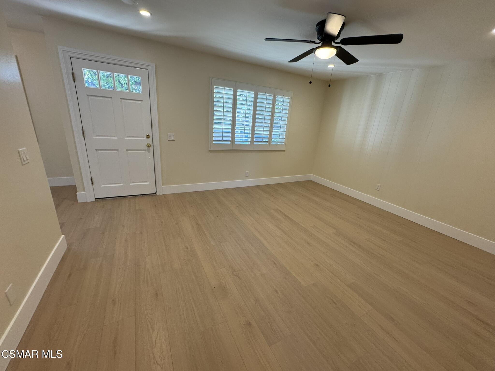 1567 Sequoia Avenue Simi Valley, CA 93063 - Photo 8 of 18 wooden floor in an empty room with a window