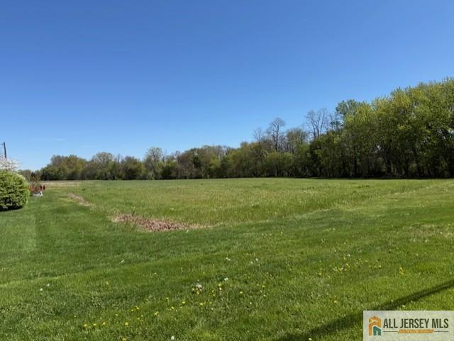 65 Walters Road Robbinsville, NJ 08691 - Photo 2 of 5 a view of a green field with clear sky