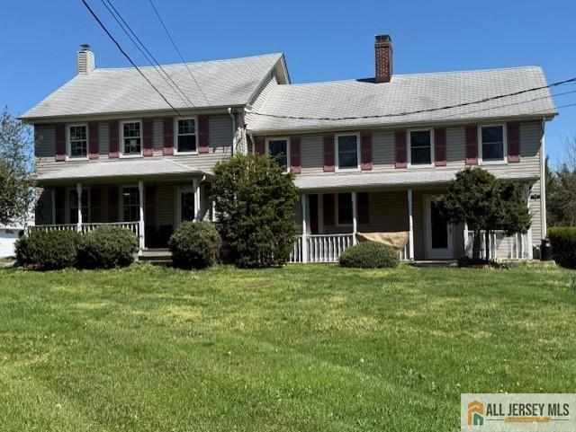65 Walters Road Robbinsville, NJ 08691 - Photo 4 of 5 a front view of a house with a garden