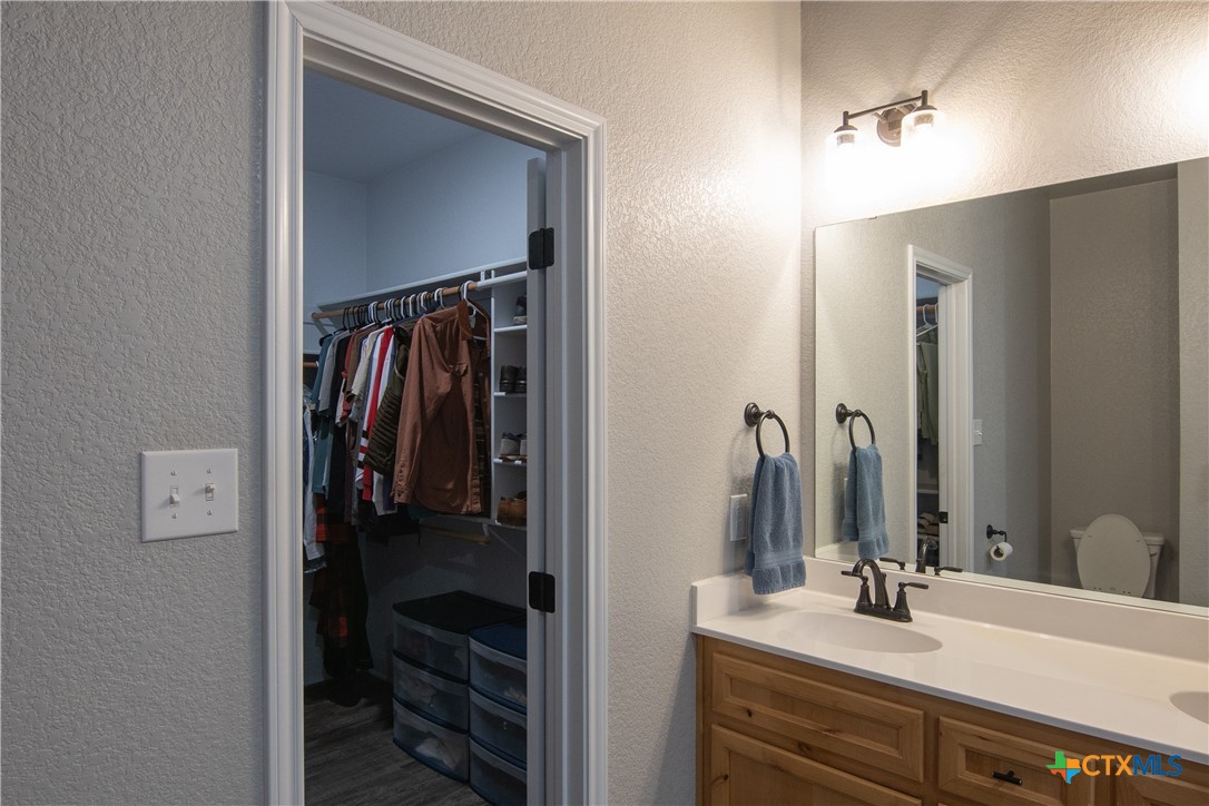 7909 McCulloch Road Temple, TX 76502 - Photo 35 of 46 a bathroom with a sink and a mirror