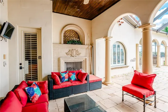 a front view of a house with outdoor seating