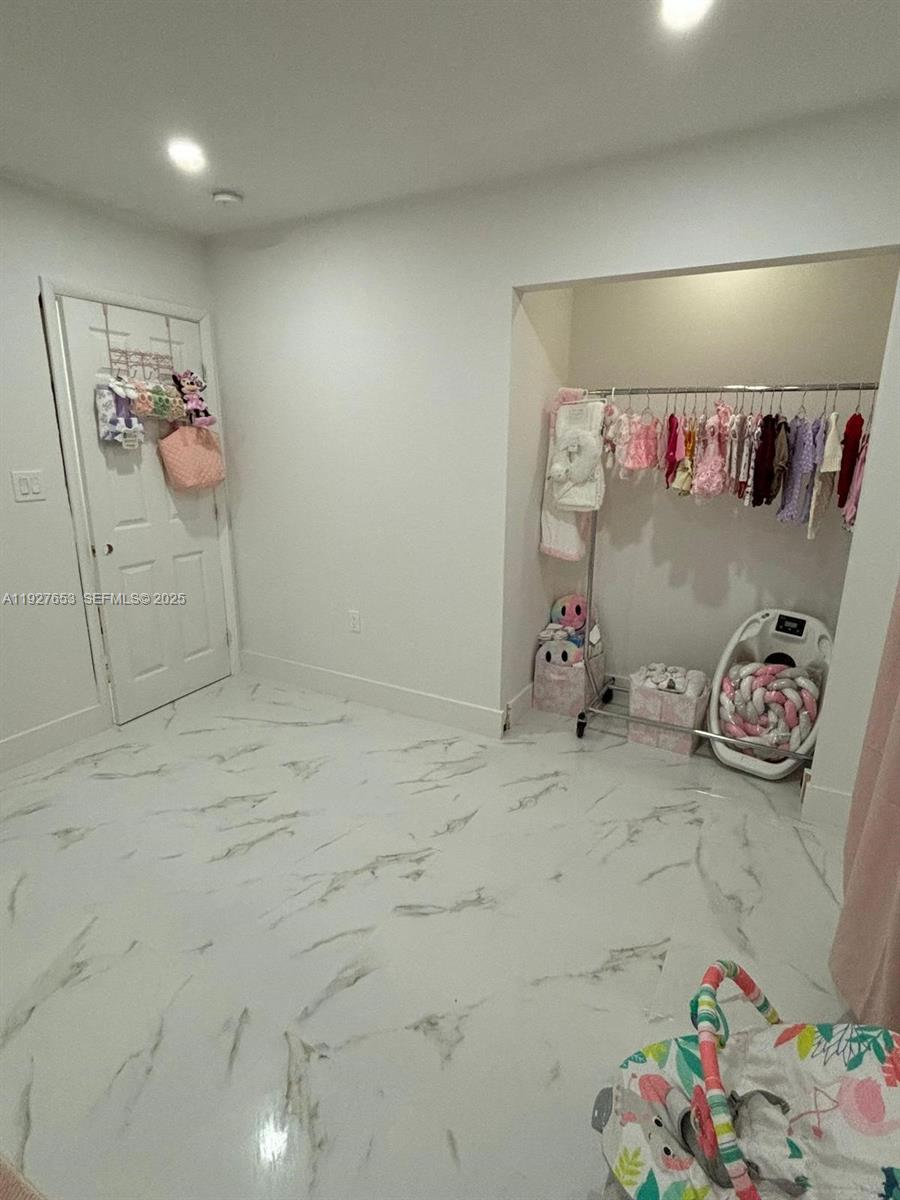 21160 Southwest 328th Street Homestead, FL 33030 - Photo 4 of 18 a view of storage and utility room