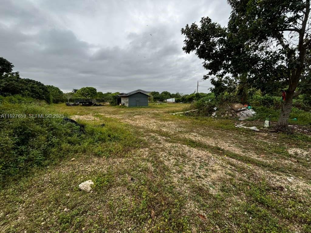 21160 Southwest 328th Street Homestead, FL 33030 - Photo 10 of 18 a view of an outdoor space and a yard