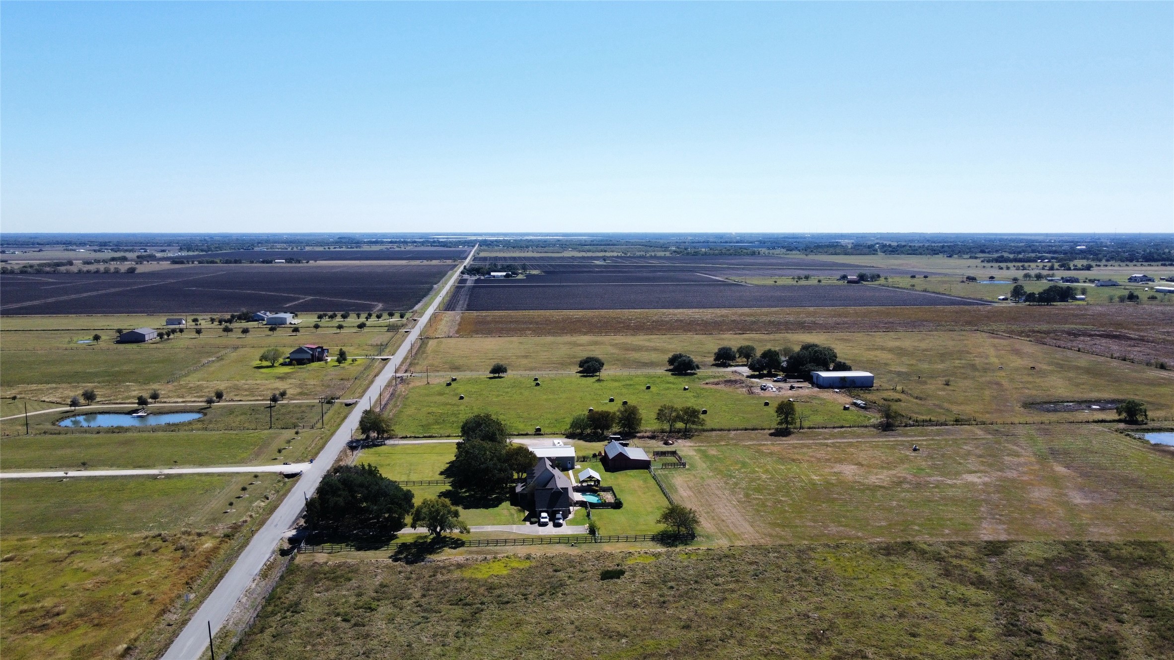 0 Roesler Road Needville, TX 77461 - Photo 6 of 14 a view of a room with water heater and wooden floor