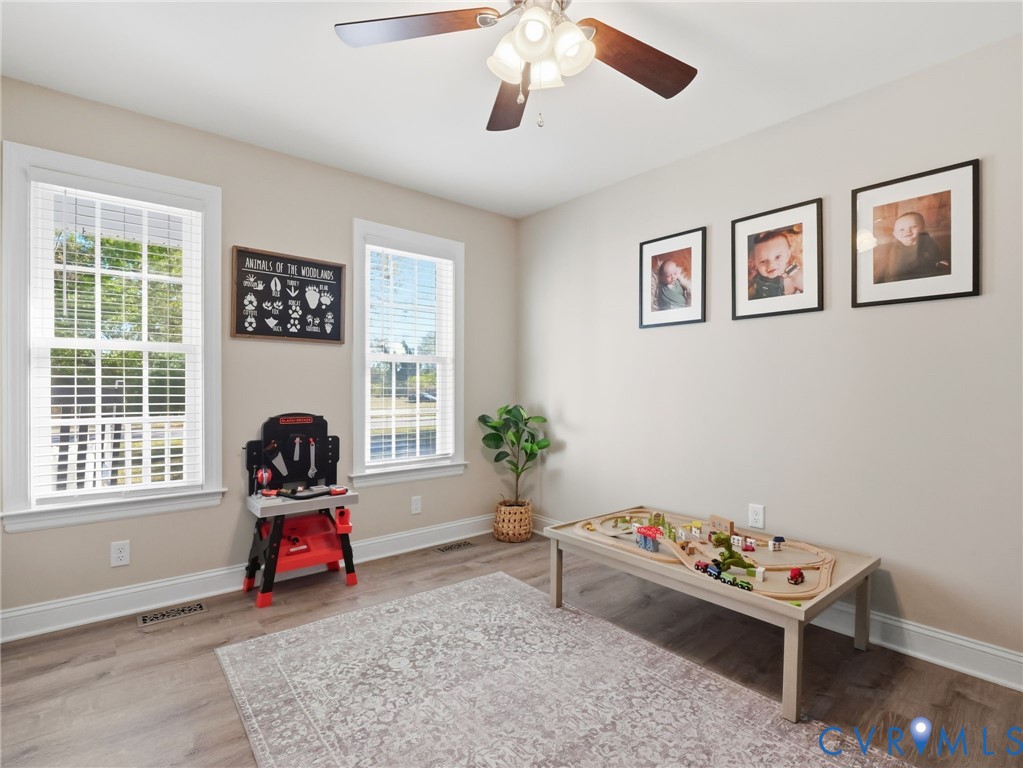 11084 West River Road Aylett, VA 23009 - Photo 16 of 36 a living room with furniture and a window