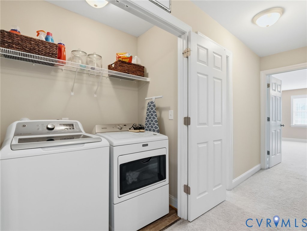 11084 West River Road Aylett, VA 23009 - Photo 32 of 36 a utility room with dryer and washer