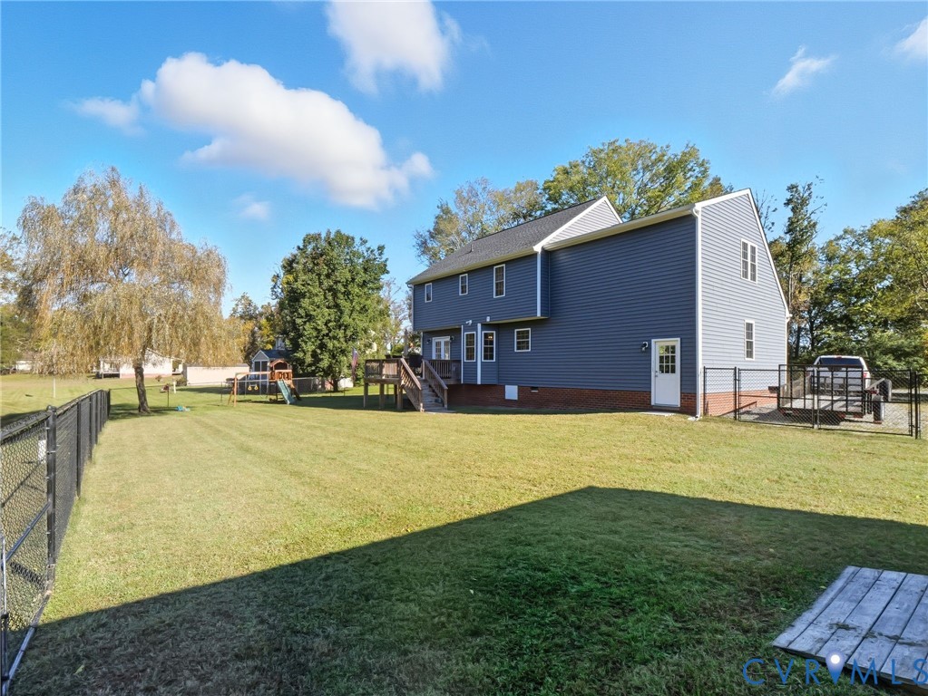 11084 West River Road Aylett, VA 23009 - Photo 34 of 36 a house view with swimming pool in front of it