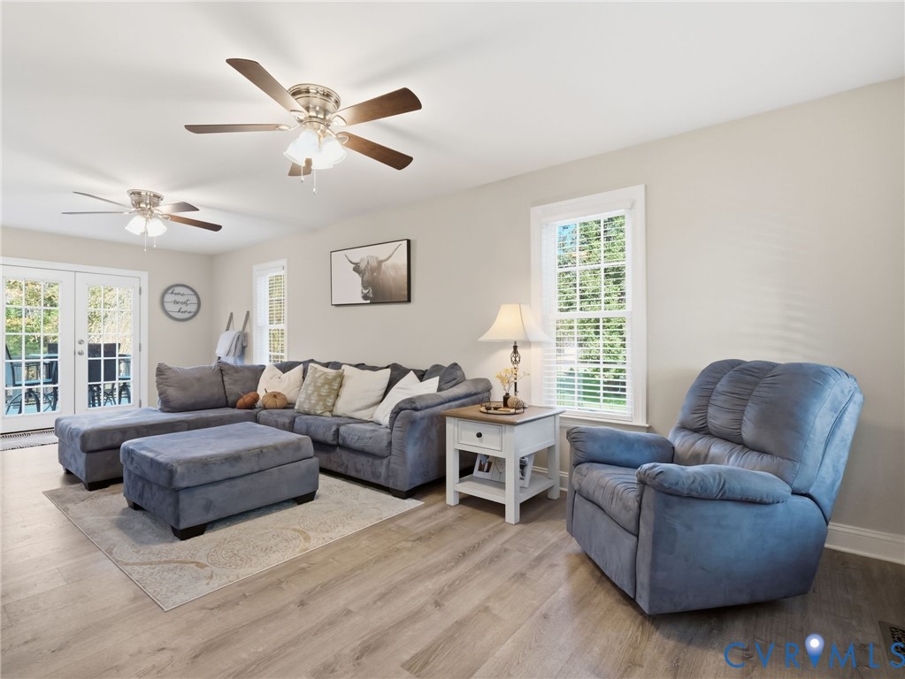 11084 West River Road Aylett, VA 23009 - Photo 7 of 36 a living room with furniture and a large window