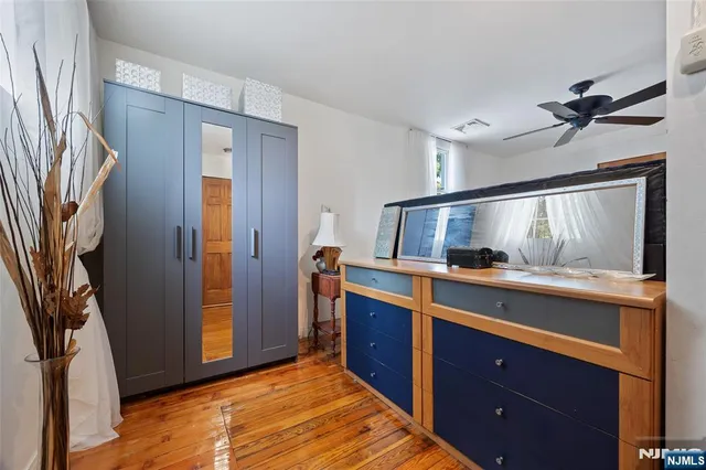 a view of cabinets and wooden floor