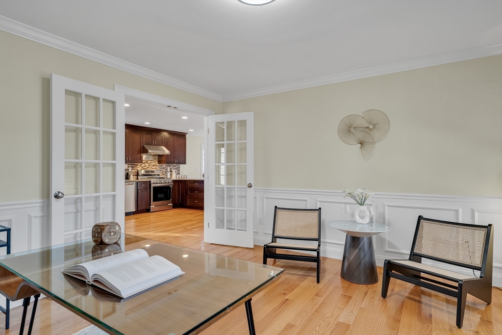 19 3rd Road Woburn, MA 01801 - Photo 16 of 41 a living room with furniture and a wooden floor