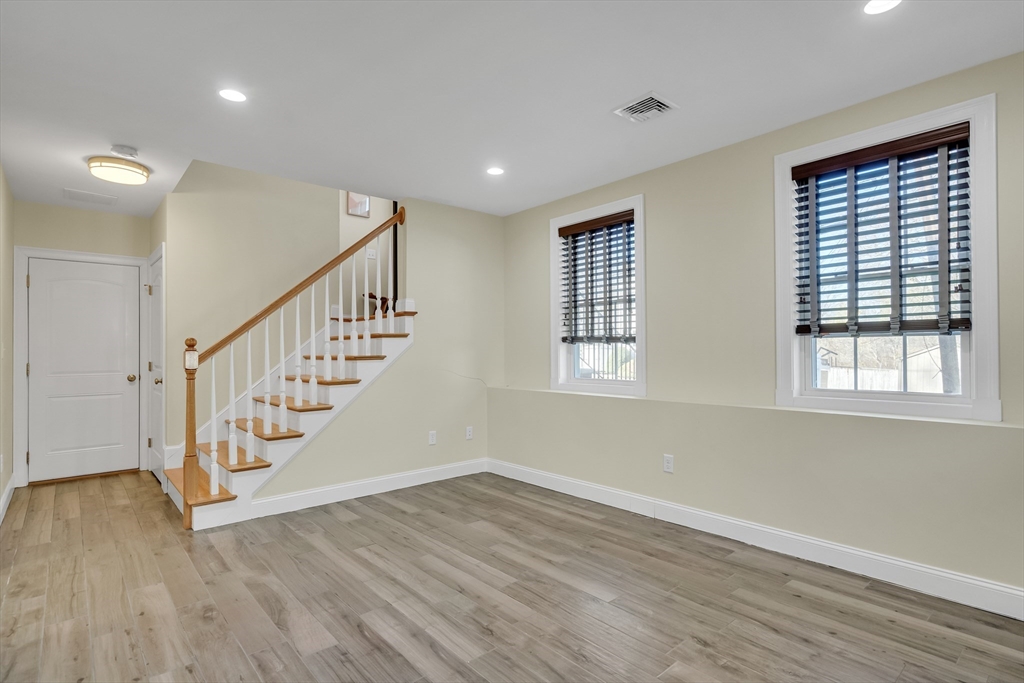 19 3rd Road Woburn, MA 01801 - Photo 31 of 41 a view of entryway with wooden floor and stairs