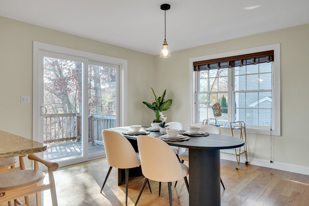 19 3rd Road Woburn, MA 01801 - Photo 8 of 41 a view of a dining room with furniture window and outside view