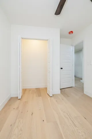 a bathroom with a toilet sink and shower
