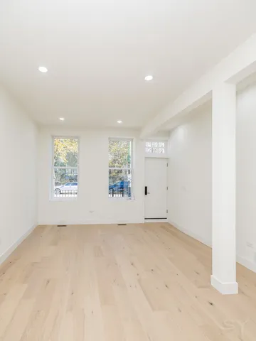 an empty room with windows