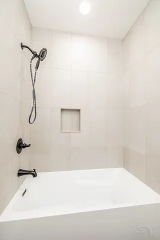 a bathroom with a bathtub
