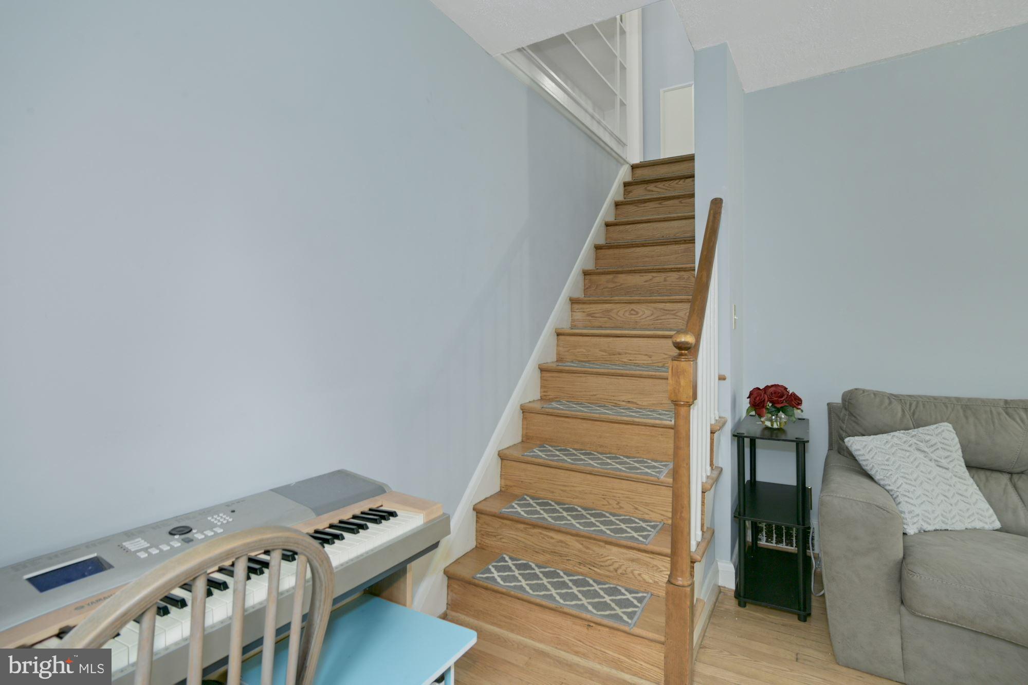 3012 Dunmurry Road Dundalk, MD 21222 - Photo 15 of 26 HARDWOOD FLOORS ON STEPS