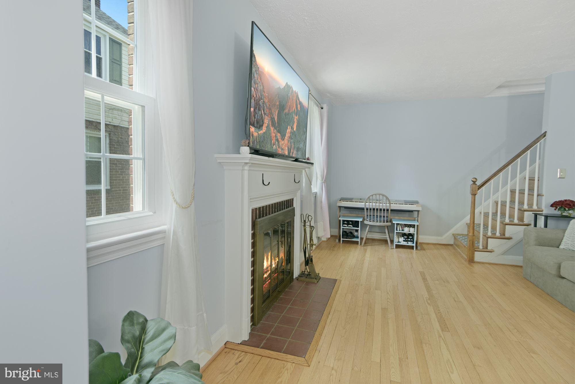 3012 Dunmurry Road Dundalk, MD 21222 - Photo 6 of 26 LIVING ROOM WITH WOOD BURNING FIREPLACE