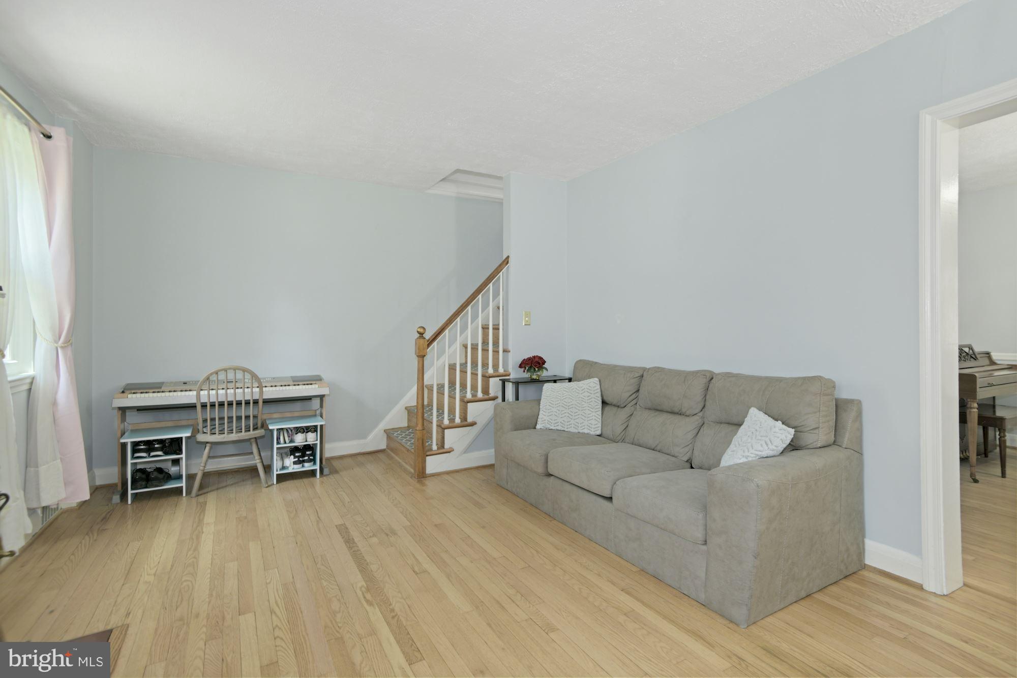 3012 Dunmurry Road Dundalk, MD 21222 - Photo 8 of 26 LIVING ROOM WITH HARDWOOD FLOORS