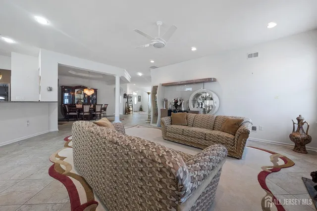 a living room with furniture and a couch