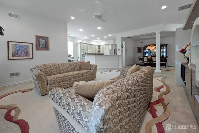 a living room with furniture and a couch