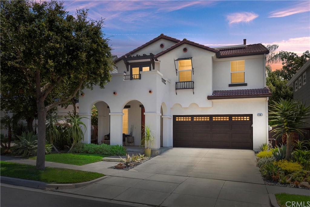 10 Marston Lane Ladera Ranch, CA 92694 - Photo 1 of 1 a front view of a house with garden