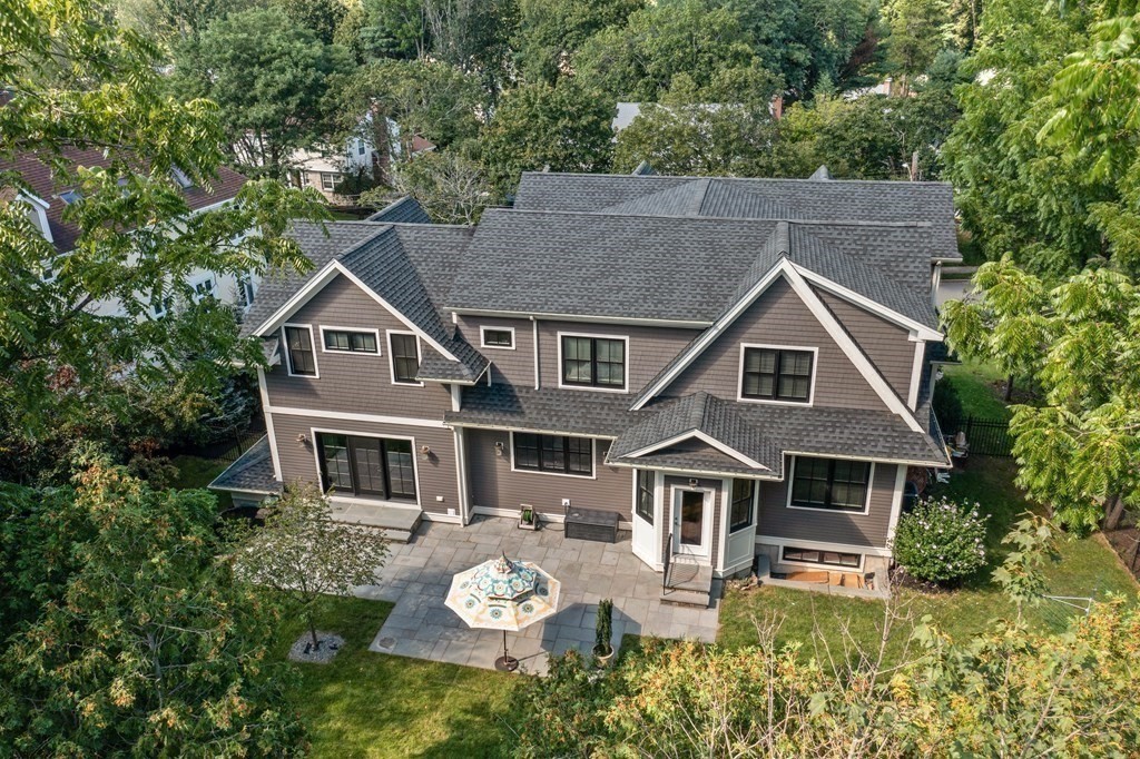 38 Wendell Road Newton, MA 02459 - Photo 39 of 42 a aerial view of a house with table and chairs