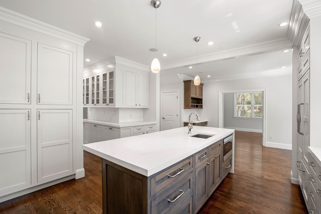 38 Wendell Road Newton, MA 02459 - Photo 8 of 42 a kitchen with a sink and a refrigerator