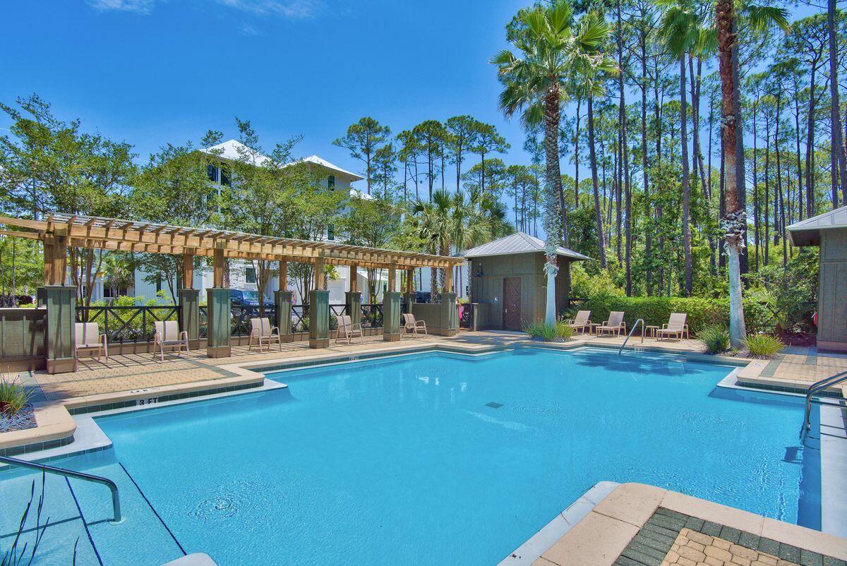Lot 46 Sweet Gum Loop Inlet Beach Inlet Beach, FL 32461 - Photo 20 of 21 a view of a house with pool and sitting area