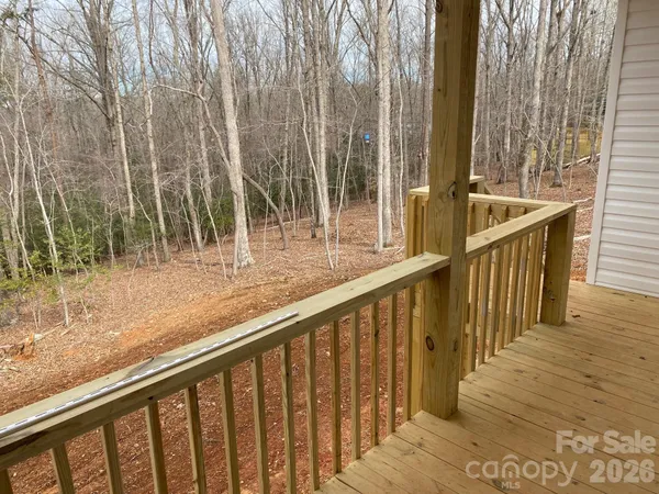 a view of balcony with furniture