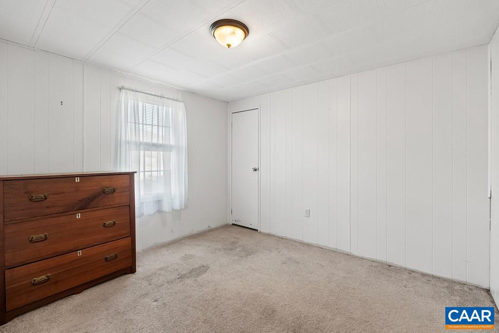 1066 Stevens Cove Road Lovingston, VA 22949 - Photo 18 of 34 an empty room with windows