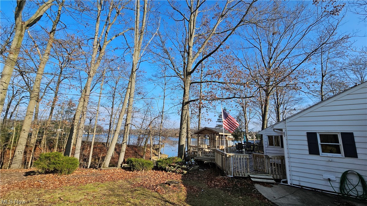 202 Ashtabula Point Rome, OH 44085 - Photo 24 of 41 View from driveway looking to Deck & Lake