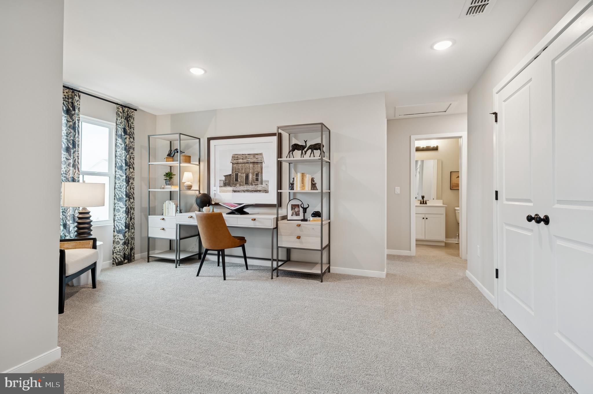 57 Sweetgum Road, Unit 33 Berlin, NJ 08009 - Photo 11 of 38 a view of a livingroom with furniture and a flat screen tv