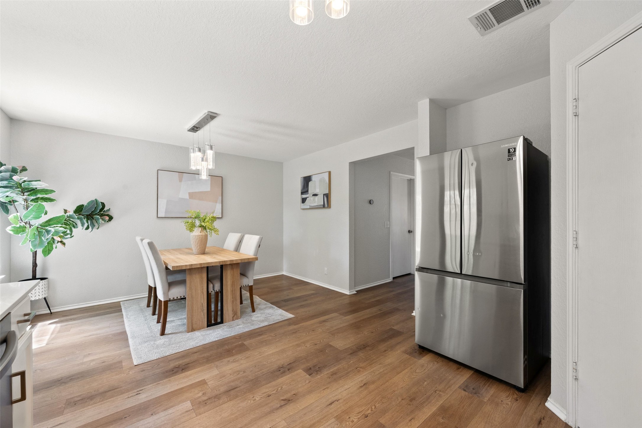 4529 Best Way Austin, TX 78725 - Photo 28 of 34 Dedicated dining area with large windows overlooking the private backyard