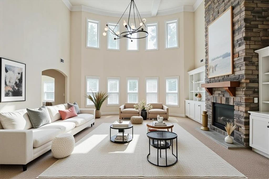 2368 Beringer Lane Powder Springs, GA 30127 - Photo 22 of 59 a living room with furniture fireplace and chandelier