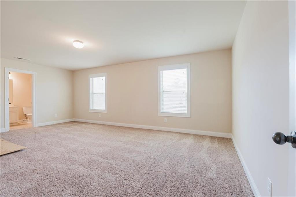 2368 Beringer Lane Powder Springs, GA 30127 - Photo 44 of 59 an empty room with windows